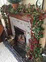 Christmas garland around the fireplace